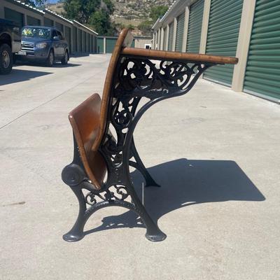 Sale Photo Thumbnail #29: Early 1900s Sears & Roebuck folding chair/desk combo with cast iron frame and solid wood seat, back, and desktop. Beautifully crafted with ornate side detailing and smooth folding seat. Great condition, clean wood surfaces and free of rust.