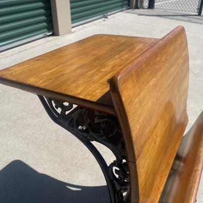 Sale Photo Thumbnail #32: Early 1900s Sears & Roebuck folding chair/desk combo with cast iron frame and solid wood seat, back, and desktop. Beautifully crafted with ornate side detailing and smooth folding seat. Great condition, clean wood surfaces and free of rust.