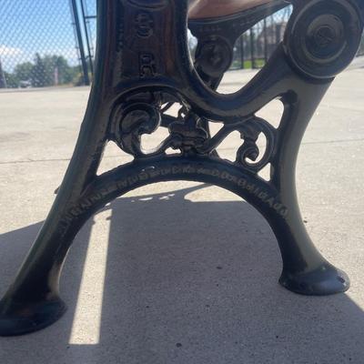 Sale Photo Thumbnail #25: Early 1900s Sears & Roebuck folding chair/desk combo with cast iron frame and solid wood seat, back, and desktop. Beautifully crafted with ornate side detailing and smooth folding seat. Great condition, clean wood surfaces and free of rust.