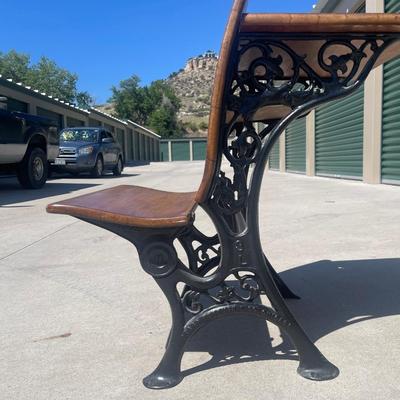 Sale Photo Thumbnail #28: Early 1900s Sears & Roebuck folding chair/desk combo with cast iron frame and solid wood seat, back, and desktop. Beautifully crafted with ornate side detailing and smooth folding seat. Great condition, clean wood surfaces and free of rust.