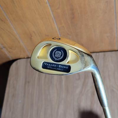 LOT 64X: Vintage Sporting Equipment Featuring Golden Cadillac Sand Wedge Golf Club, Kroydon Junior Pro Tennis Racket and More