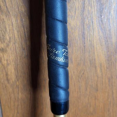 LOT 64X: Vintage Sporting Equipment Featuring Golden Cadillac Sand Wedge Golf Club, Kroydon Junior Pro Tennis Racket and More