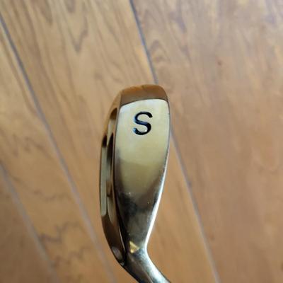 LOT 64X: Vintage Sporting Equipment Featuring Golden Cadillac Sand Wedge Golf Club, Kroydon Junior Pro Tennis Racket and More