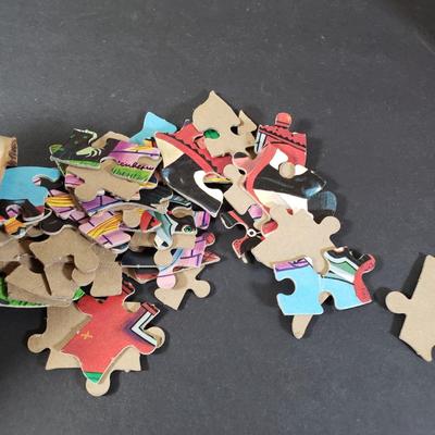 LOT 85X: Vintage HG TOYS Puzzles in a Can and Assorted Dolls