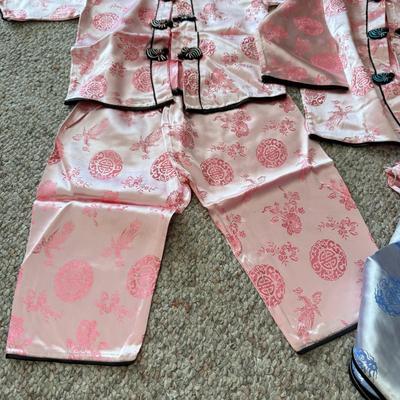 LOT 101L: Set of Different Sized Vintage Silk Outfits in Pink and Blue