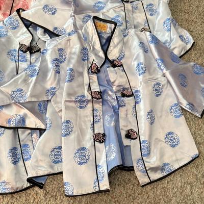 LOT 101L: Set of Different Sized Vintage Silk Outfits in Pink and Blue