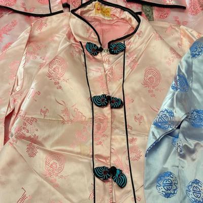 LOT 101L: Set of Different Sized Vintage Silk Outfits in Pink and Blue