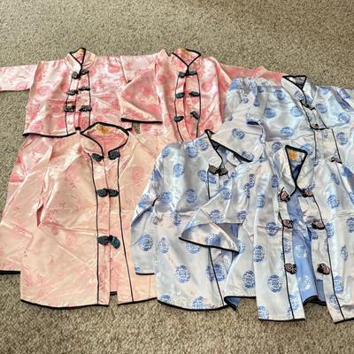 LOT 101L: Set of Different Sized Vintage Silk Outfits in Pink and Blue