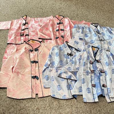 LOT 101L: Set of Different Sized Vintage Silk Outfits in Pink and Blue