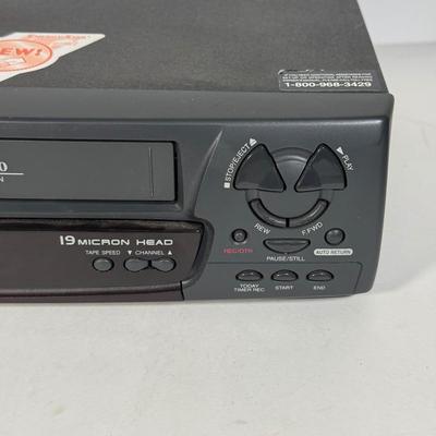 LOT 115D: Syvania VCR Model 2965LF w/ Collection of DVDs