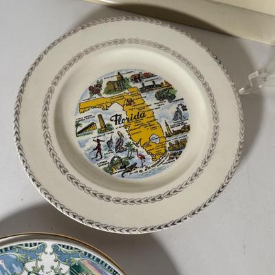 LOT 116D: Collection of Souvenir Plates, Wooden Plate Frames, Tasco Binoculars in Box & Vintage 1960s "Touring Kit"