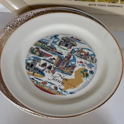 LOT 116D: Collection of Souvenir Plates, Wooden Plate Frames, Tasco Binoculars in Box & Vintage 1960s "Touring Kit"