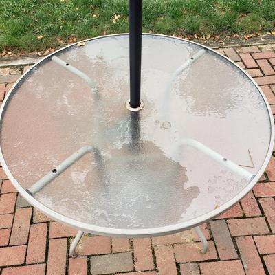 LOT 139: Glass Outdoor Table with Adjustable Umbrella & Stand