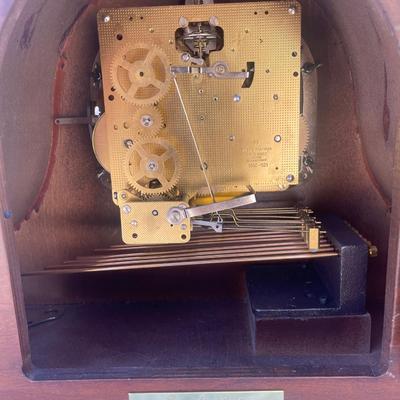 Sale Photo Thumbnail #62: Beautiful Sligh Mantel Clock, in good condition. Some damage to the wood on the top and back of the clock, front looks great. Inside appears very clean. Approximately 17"x7"x10"