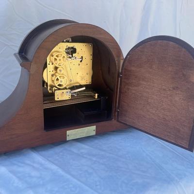Sale Photo Thumbnail #58: Beautiful Sligh Mantel Clock, in good condition. Some damage to the wood on the top and back of the clock, front looks great. Inside appears very clean. Approximately 17"x7"x10"
