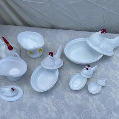 Sale Photo Thumbnail #119: Westmoreland Milk Glass Hen on Nest covered dishes, selling as a set of 6. Includes a rooster and 5 hens of various sizes. Good condition, a few scratches and chips here and there. Very cool set with "WC" (Westmoreland Co) logo inside each lid.