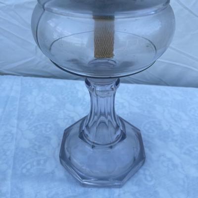 Sale Photo Thumbnail #154: Antique Glass Oil Lamp with wick and removable glass chimney. Approximately 5" base and 21" height (including glass chimney). Funky size and great condition!