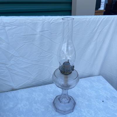 Sale Photo Thumbnail #152: Antique Glass Oil Lamp with wick and removable glass chimney. Approximately 5" base and 21" height (including glass chimney). Funky size and great condition!