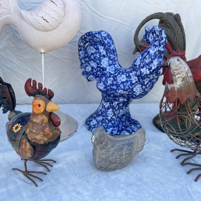 Sale Photo Thumbnail #183: Lot of 8 rooster/chicken sculptures in a variety of sizes. 4 are plaster/pottery, 4 are metal. Great variety for a chicken lover!