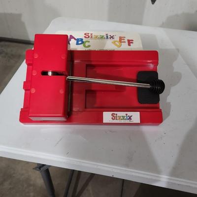 Sale Photo Thumbnail #251: Sizzix Original Red Personal Die-Cutter Press Bag, Die Cutter + Accessories