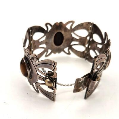 Lot #47 Beautiful Mexican Sterling Silver (marked) Bracelet set with Tiger Eye