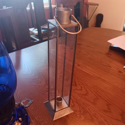 BLUE GLASS OIL LAMP AND A CANDLE LANTERN