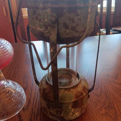 RIBBED GLASS OIL LAMP AND A REPRODUCTION METAL LANTERN