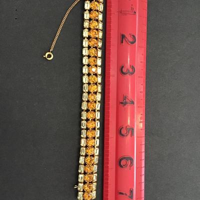 Beautiful gold tone bracelet with Topaz and rhinestones