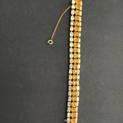 Beautiful gold tone bracelet with Topaz and rhinestones