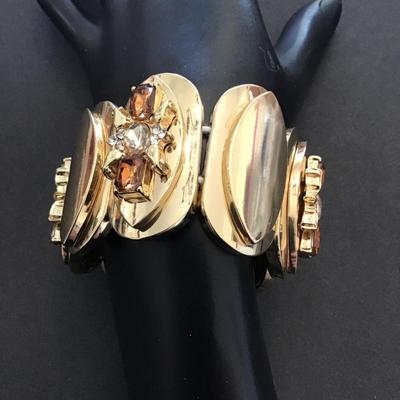 Beautiful gold tone, stretchy bracelet with Multi colored, rhinestones