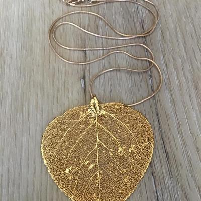 Large gold tone leaf statement necklace