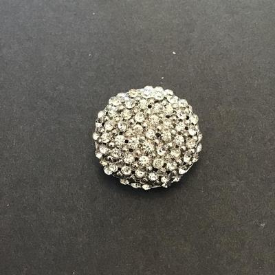 Silver tone brooch with clear rhinestones