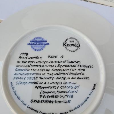 Sale Photo Thumbnail #232: Manufacturer: Knowles China.
Year: 1998.
Title: "Santa's Helpers".
Collectibility: It is a limited edition collector's plate and often comes with a certificate of authenticity, as seen in the imag