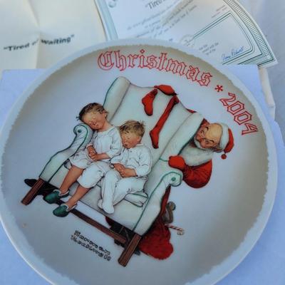 Sale Photo Thumbnail #238: Artist & Manufacturer: It features a classic Norman Rockwell illustration and was produced by Knowles China, sold by The Bradford Exchange as part of their annual Christmas plate series.
Title and Year: The plate is titled "Tired of Waiting" and specifica
