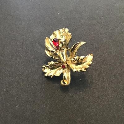 Vintage Coro Gold tone with red rhinestones brooch
