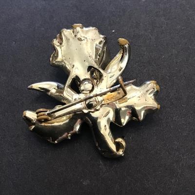 Vintage Coro Gold tone with red rhinestones brooch