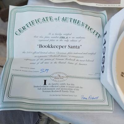 Sale Photo Thumbnail #331: "Bookkeeper Santa". 
It is a vintage Christmas-themed plate made of fine china by Knowles. 
The design depicts Santa Claus as a bookkeeper, surrounded by children's faces. 
It is an 8-inch diameter plate and comes with a Certificate of Authenticity but no