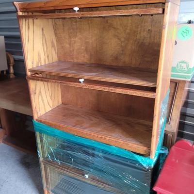 Sale Photo Thumbnail #469: Hutch is partially wrapped and will be fully wrapped again for protection. It seems not to have a mark on it, only the top cabinet has the leaded glass, but all lift up and slide back.
60" tall,  30" wide and 12.5" deep, beautiful piece.