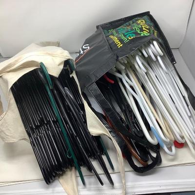 Sale Photo Thumbnail #198: You get two bags of plastic hangers.