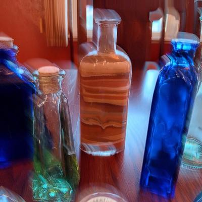 A VARIETY OF SMALLER BOTTLES