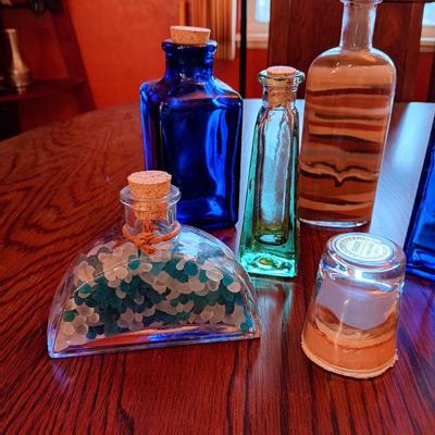 A VARIETY OF SMALLER BOTTLES