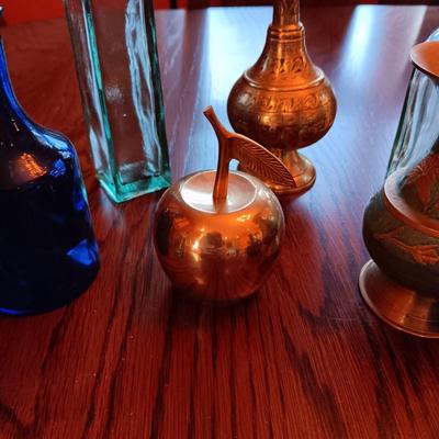 GLASS BOTTLES AND BRASS DECOR