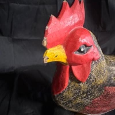 A ROOSTER AND A METAL WALL HUNG PLATE HOLDER