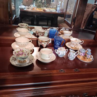 SHIRLEY TEMPLE AND MUSTACHE CUPS PLUS TEACUPS AND SAUCERS