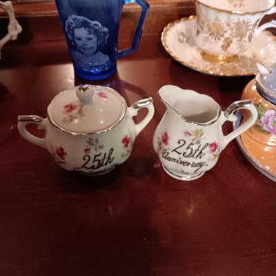 SHIRLEY TEMPLE AND MUSTACHE CUPS PLUS TEACUPS AND SAUCERS