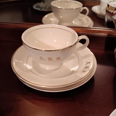 SHIRLEY TEMPLE AND MUSTACHE CUPS PLUS TEACUPS AND SAUCERS