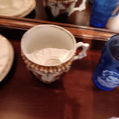 SHIRLEY TEMPLE AND MUSTACHE CUPS PLUS TEACUPS AND SAUCERS