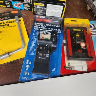 Box lot of New Tools in original package Dowrling Kit, Battery testers , Arrow T50 Stapler Black And Decker Drill Bits Hex Crimping tool