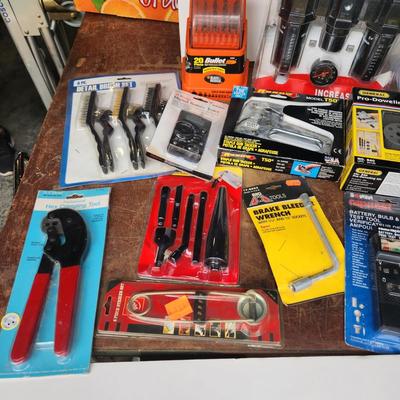 Box lot of New Tools in original package Dowrling Kit, Battery testers , Arrow T50 Stapler Black And Decker Drill Bits Hex Crimping tool