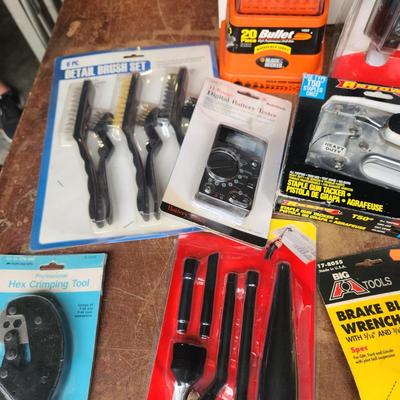 Box lot of New Tools in original package Dowrling Kit, Battery testers , Arrow T50 Stapler Black And Decker Drill Bits Hex Crimping tool